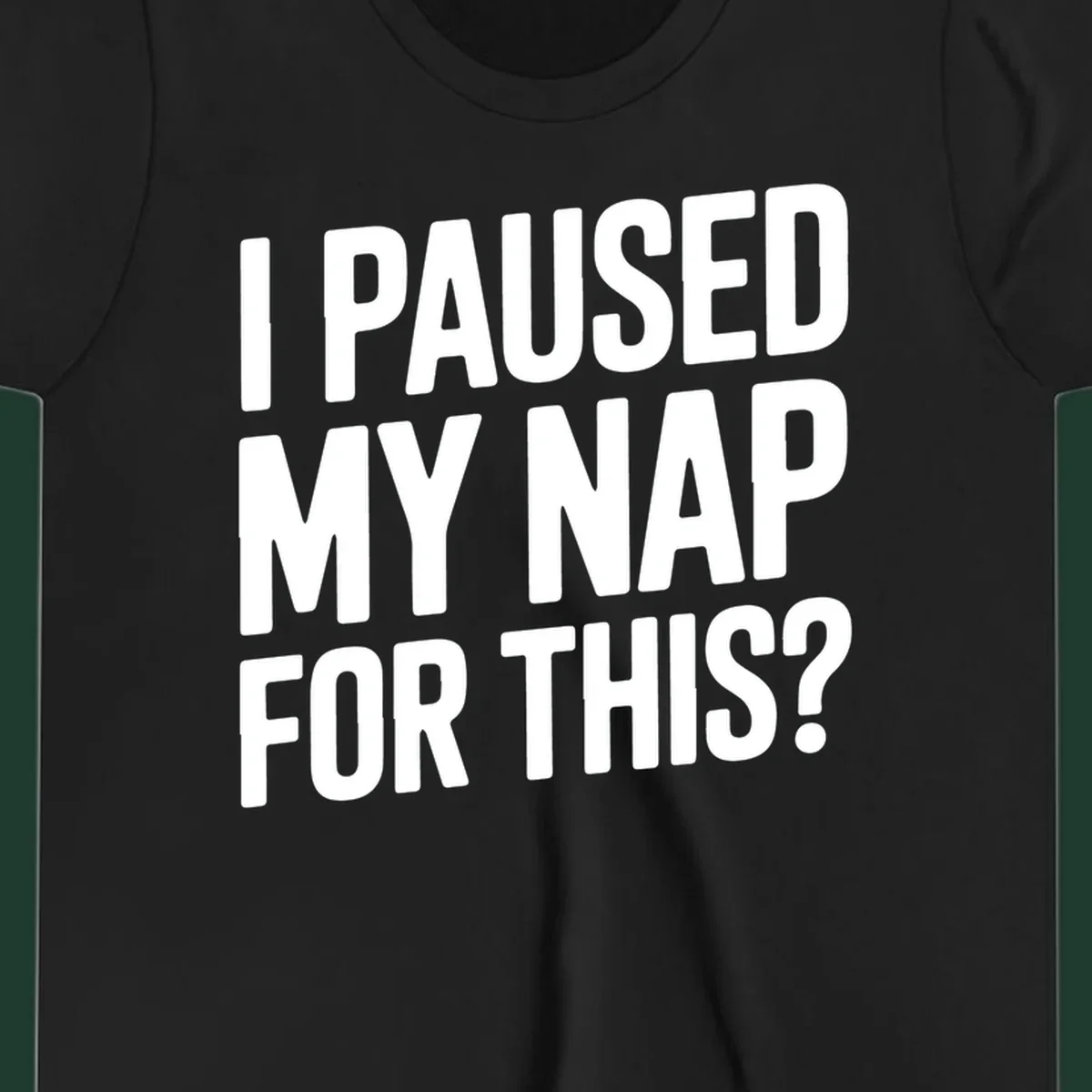 White typography quote 'I PAUSED MY NAP FOR THIS?' on a black background.