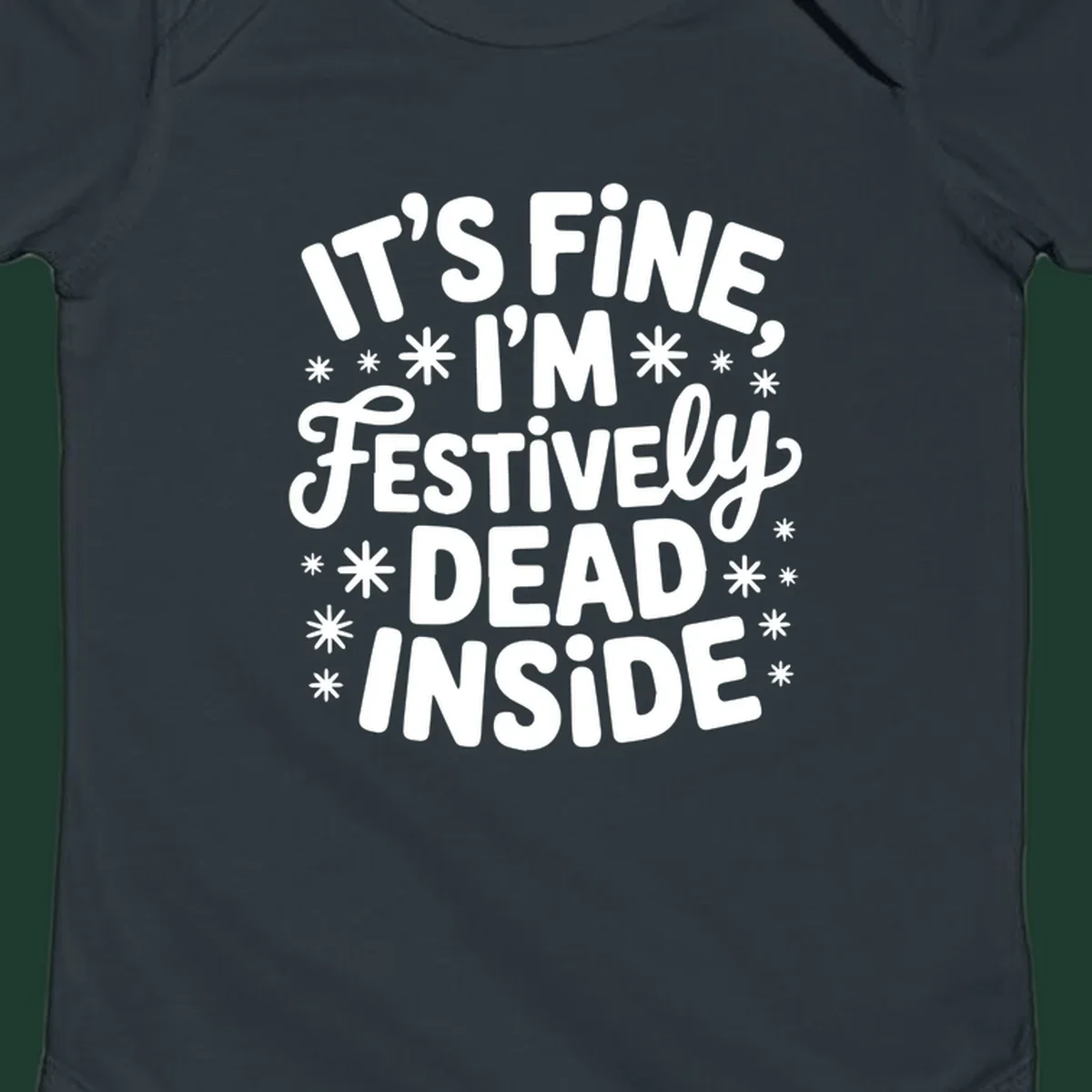It's Fine I'm Festively Dead Inside typography design with snowflakes.