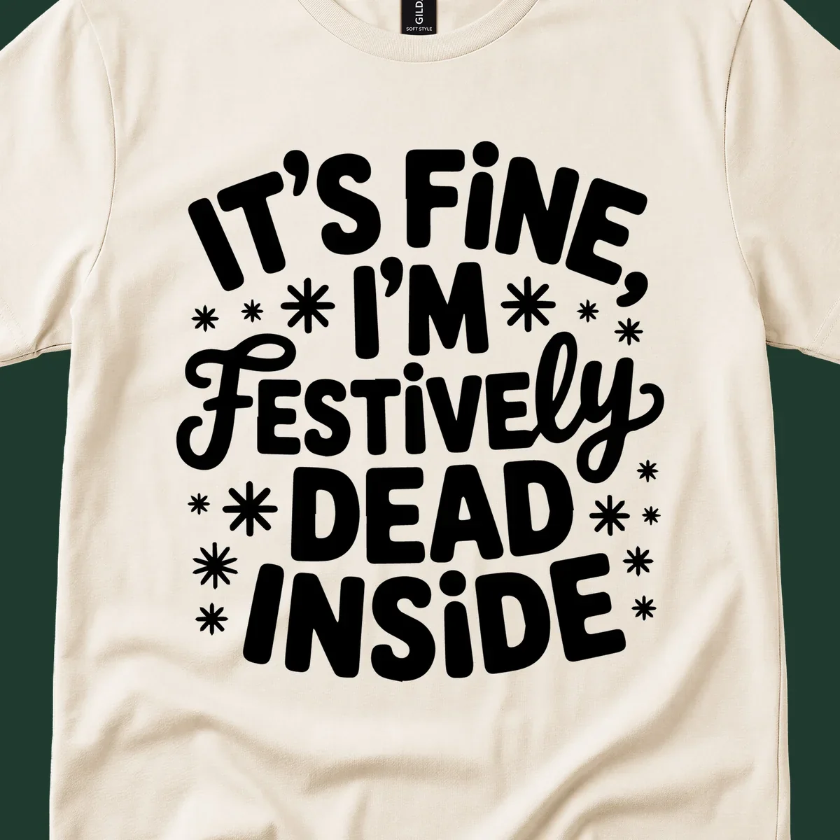 It's Fine I'm Festively Dead Inside typography design with snowflakes.