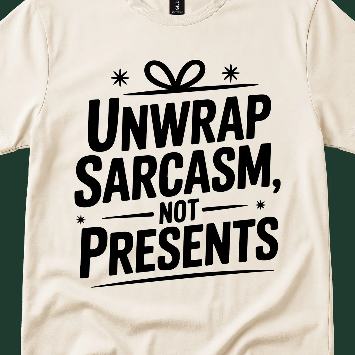 Unwrap Sarcasm Not Presents text design with snowflakes and gift ribbon.