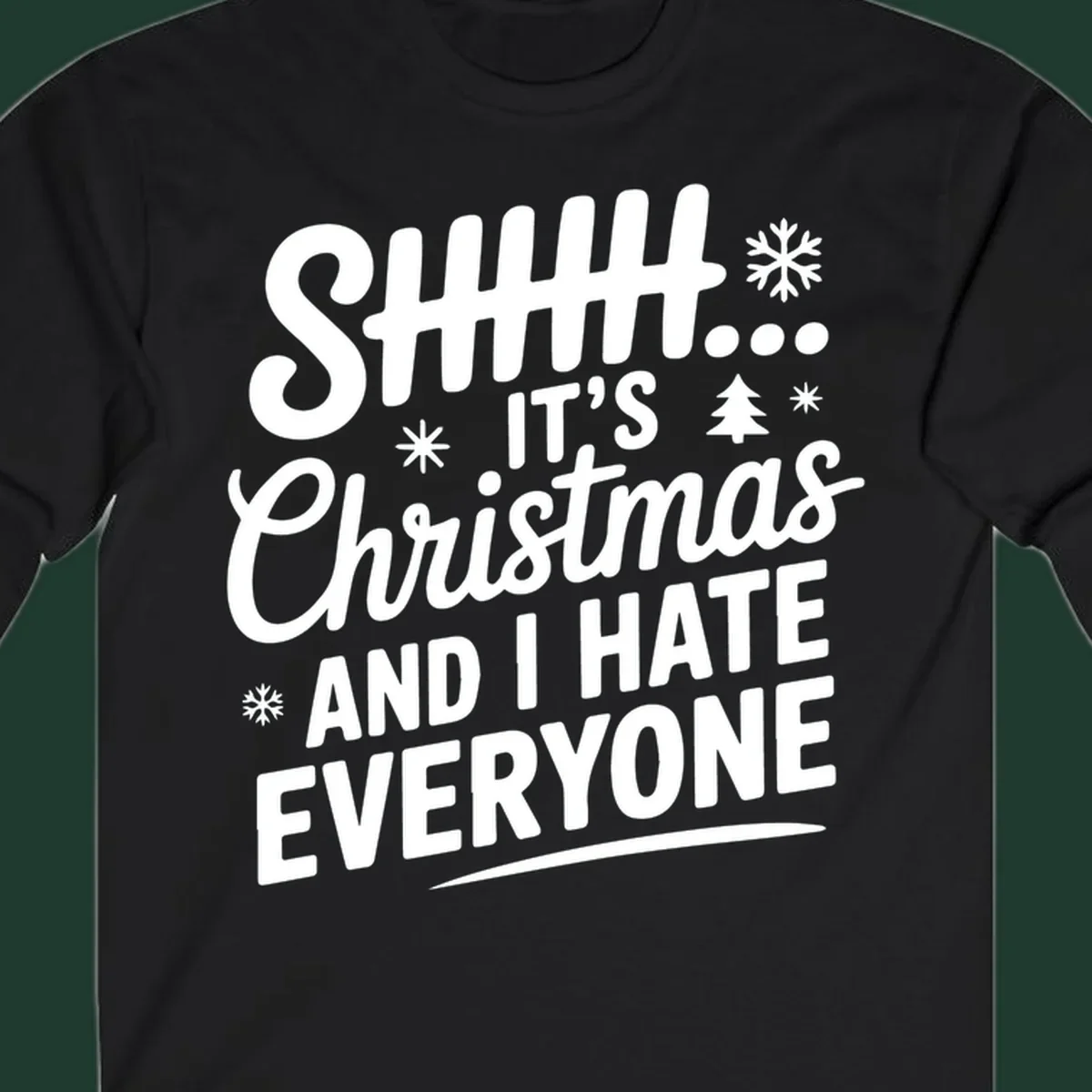 Shhh It's Christmas And I Hate Everyone text design with snowflake and tree graphics.