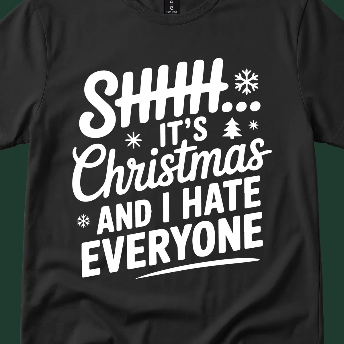 Shhh It's Christmas And I Hate Everyone text design with snowflake and tree graphics.