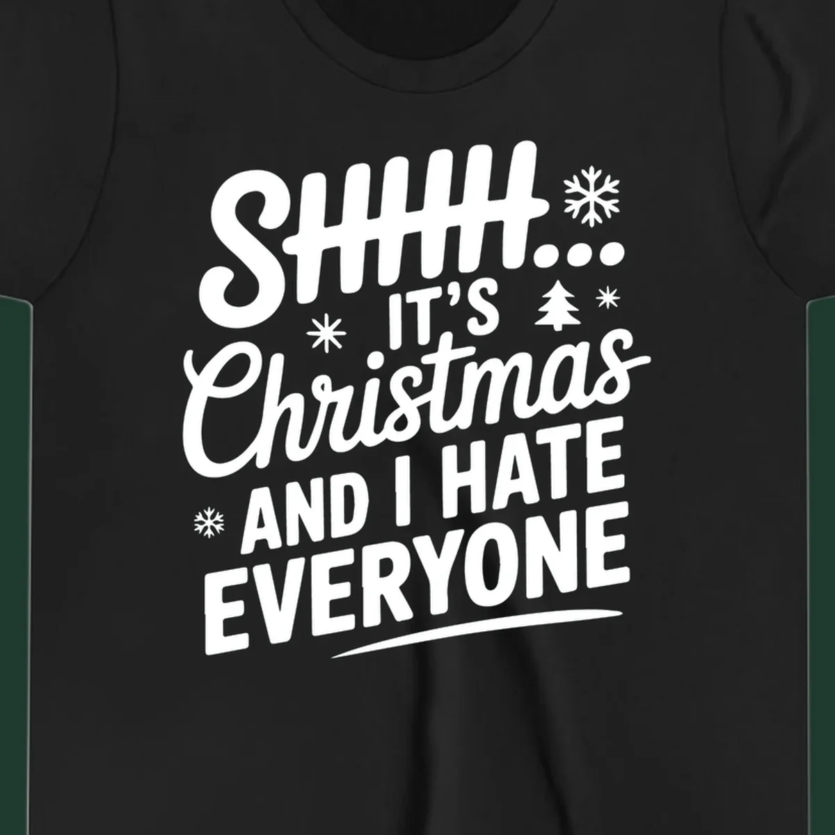 Shhh It's Christmas And I Hate Everyone text design with snowflake and tree graphics.