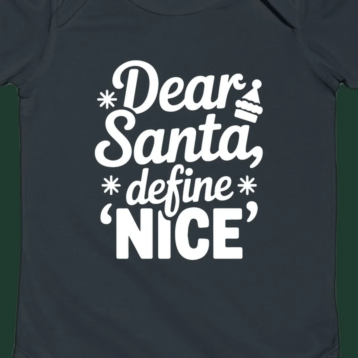 Black t-shirt design with white text asking 'Dear Santa, define NICE', accented by snowflakes and a Santa hat.