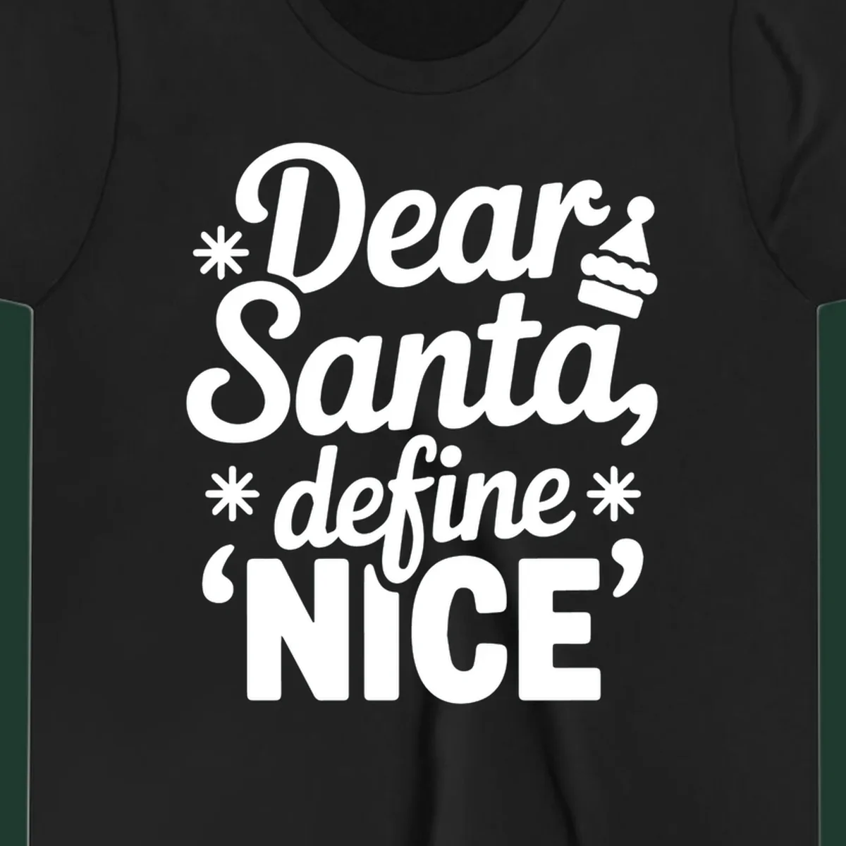 Black t-shirt design with white text asking 'Dear Santa, define NICE', accented by snowflakes and a Santa hat.