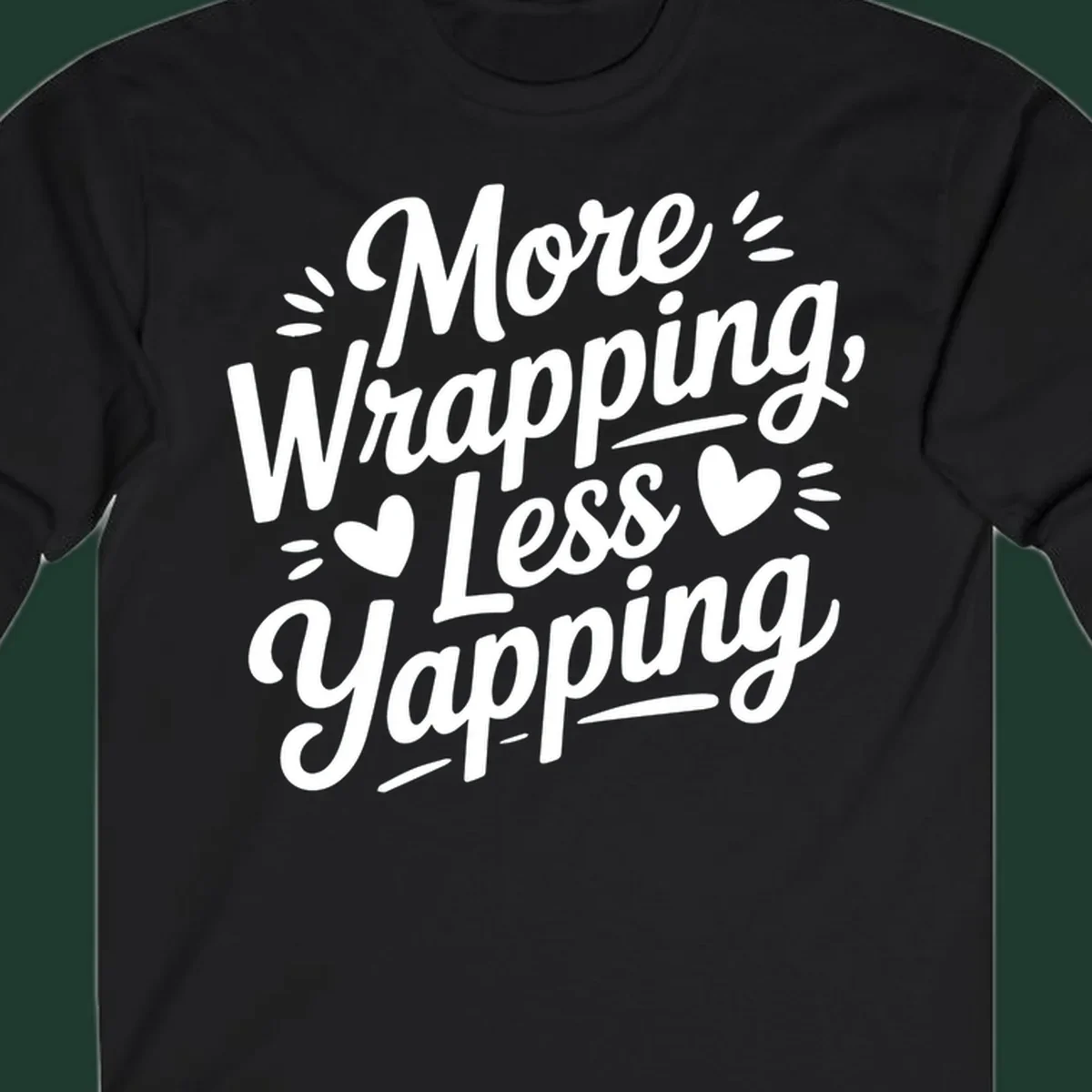 More Wrapping Less Yapping typography design with hearts and dashes.