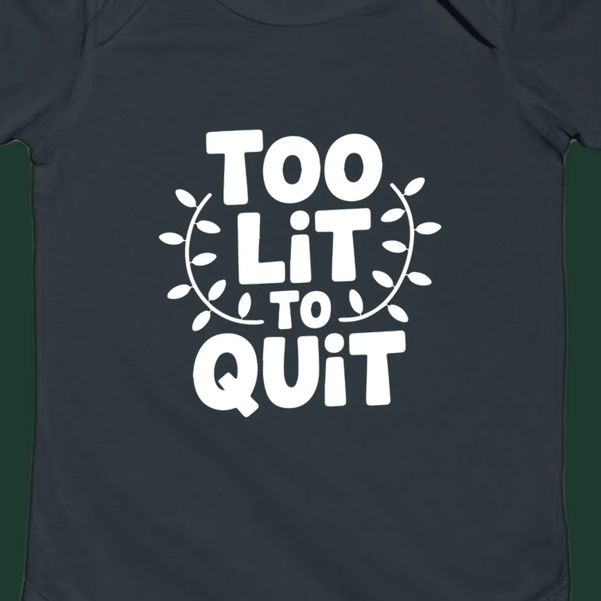 Too Lit To Quit phrase with leafy branches graphic.