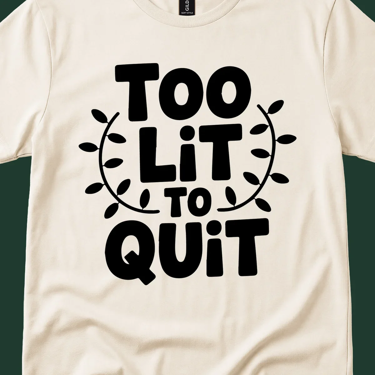 Too Lit To Quit phrase with leafy branches graphic.