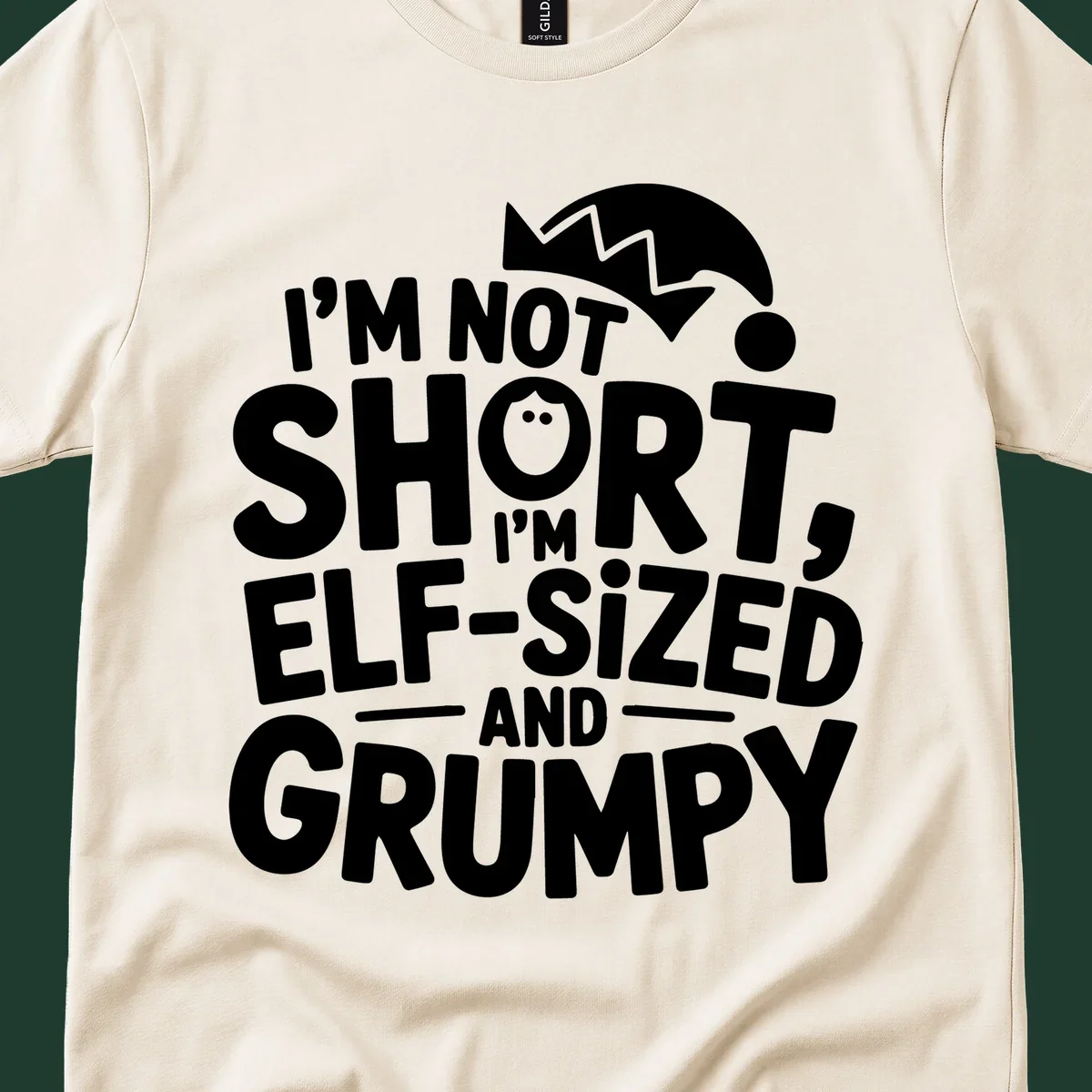 White text reading 'I'M NOT SHORT, I'M ELF-SIZED AND GRUMPY' with an elf hat illustration.