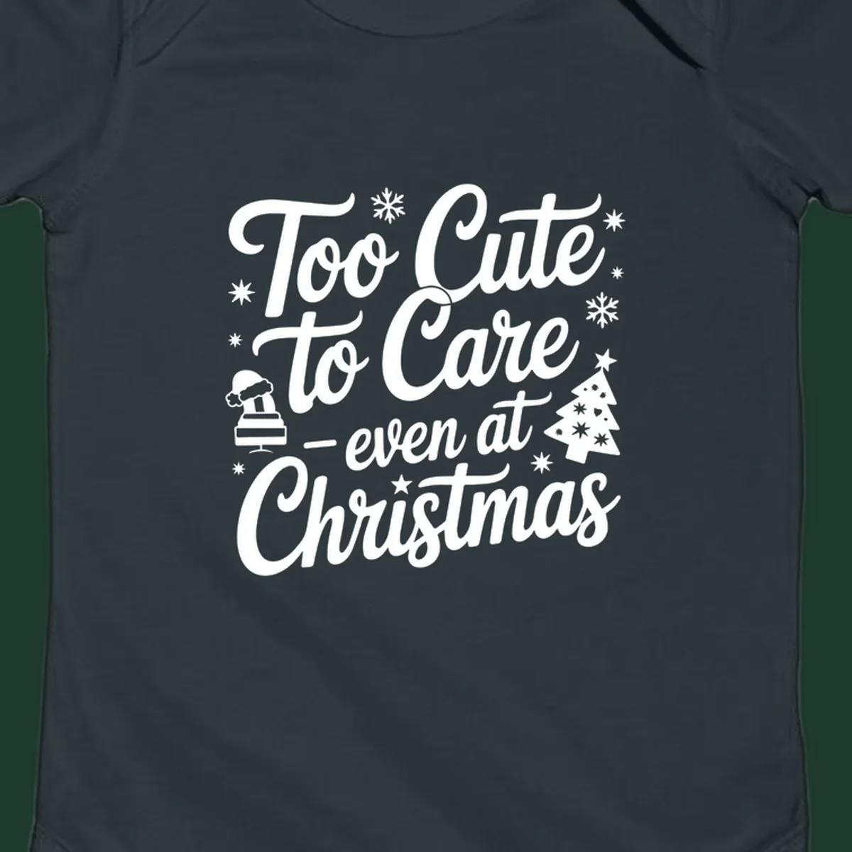White text design 'Too Cute to Care - even at Christmas' with snowflakes, a tree, and Santa hat.