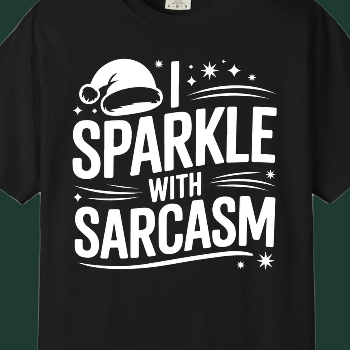 Graphic with Santa hat and text 'I SPARKLE WITH SARCASM', featuring stars and swirls.
