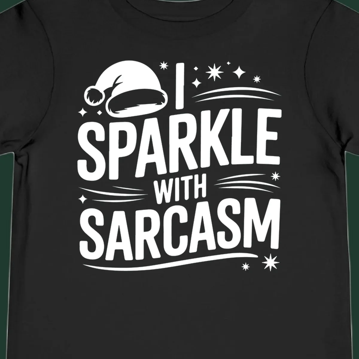 Graphic with Santa hat and text 'I SPARKLE WITH SARCASM', featuring stars and swirls.
