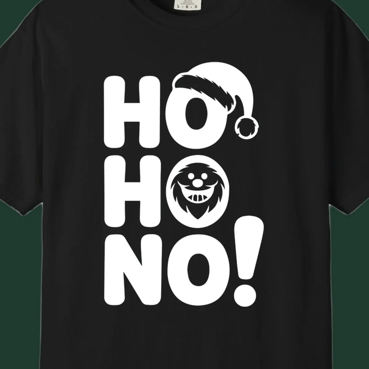 Ho ho no monster graphic with Santa hat and text on black or white background.