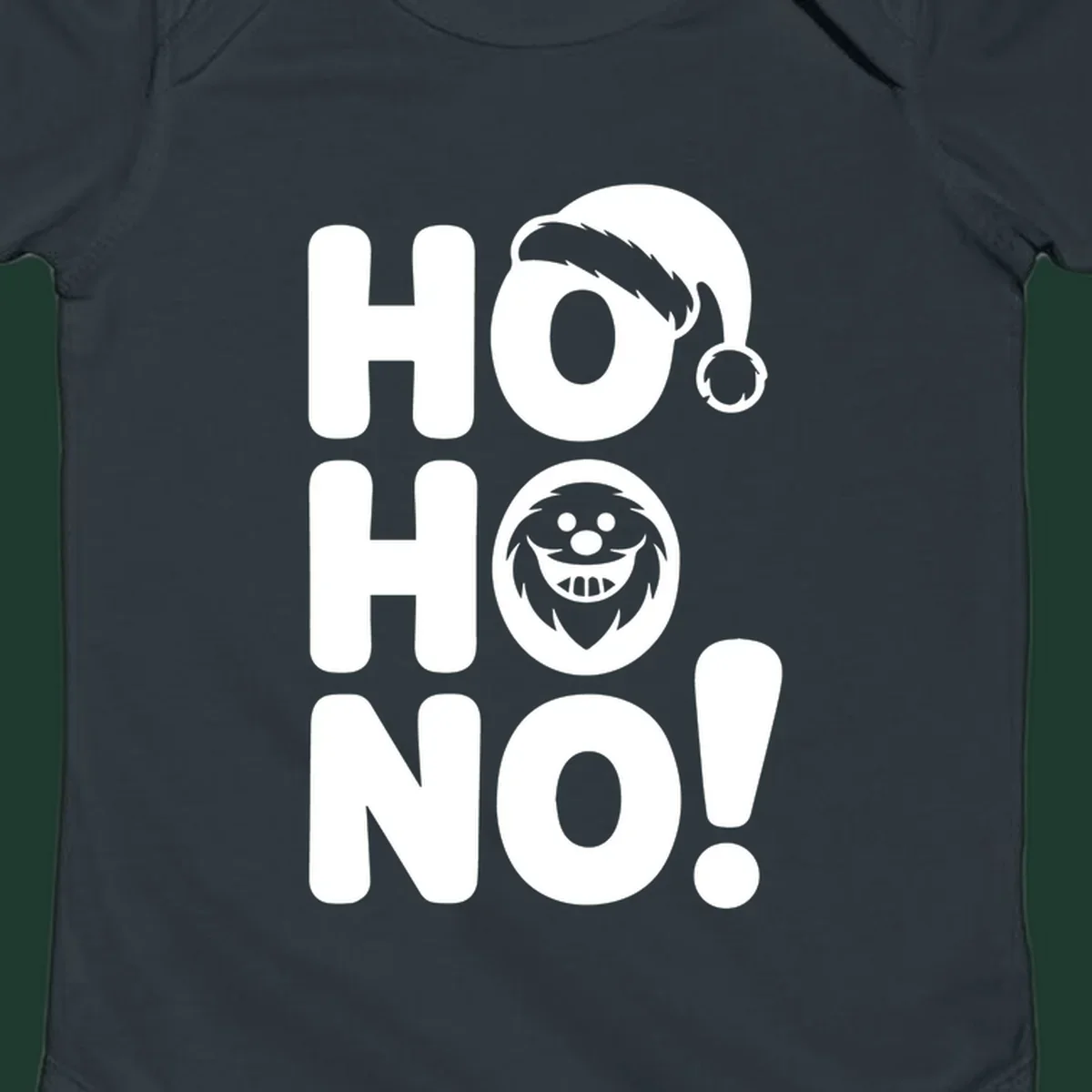 Ho ho no monster graphic with Santa hat and text on black or white background.