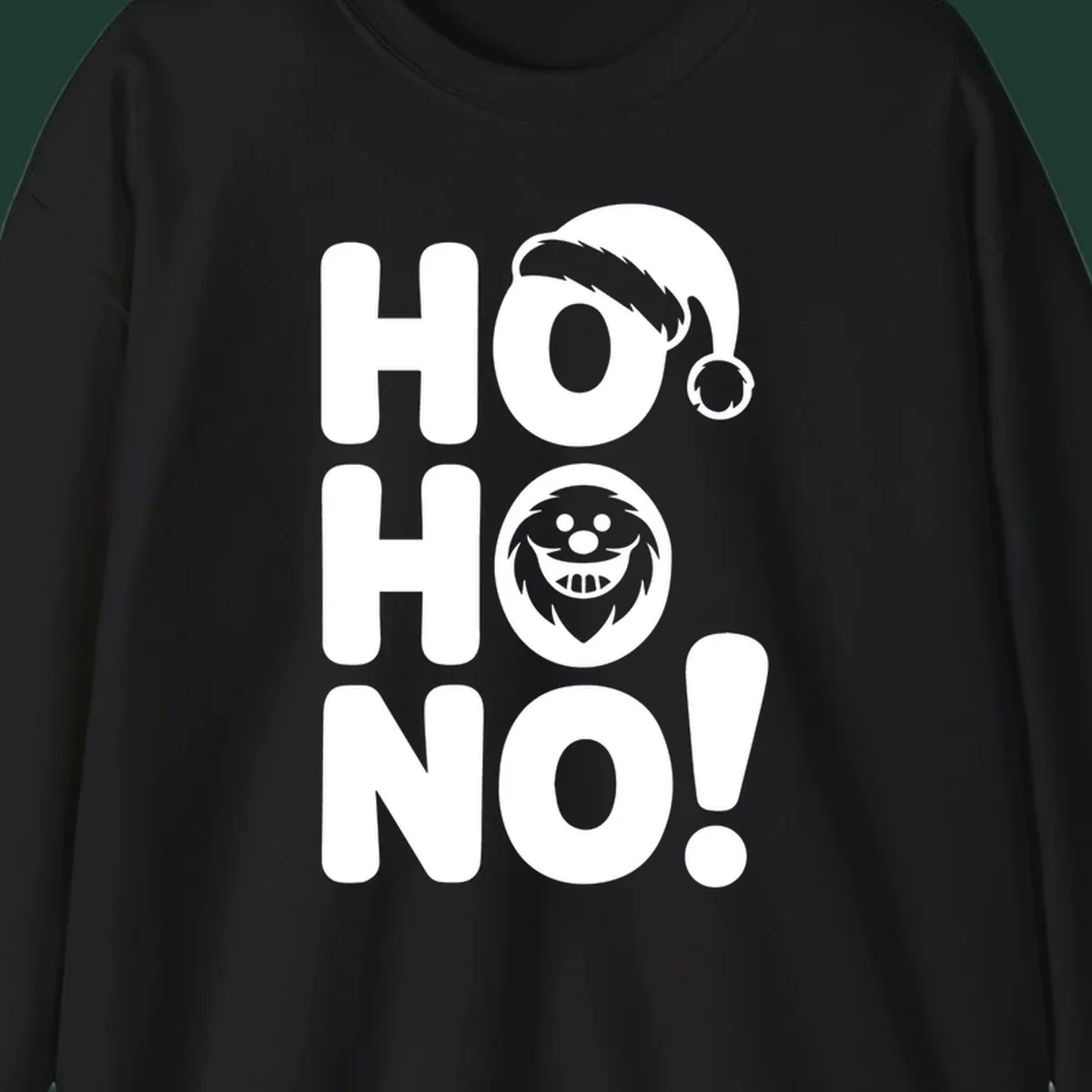 Ho ho no monster graphic with Santa hat and text on black or white background.