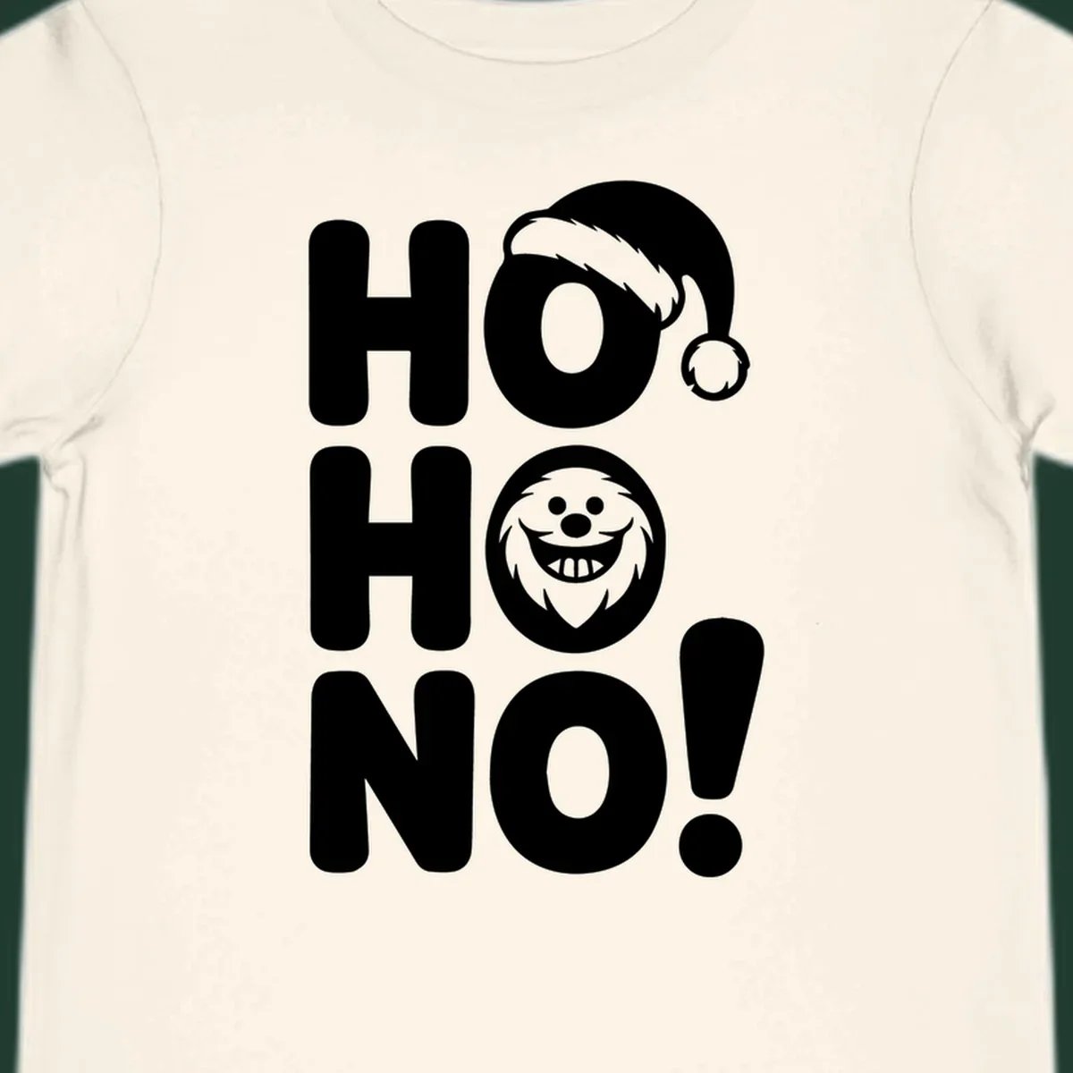 Ho ho no monster graphic with Santa hat and text on black or white background.
