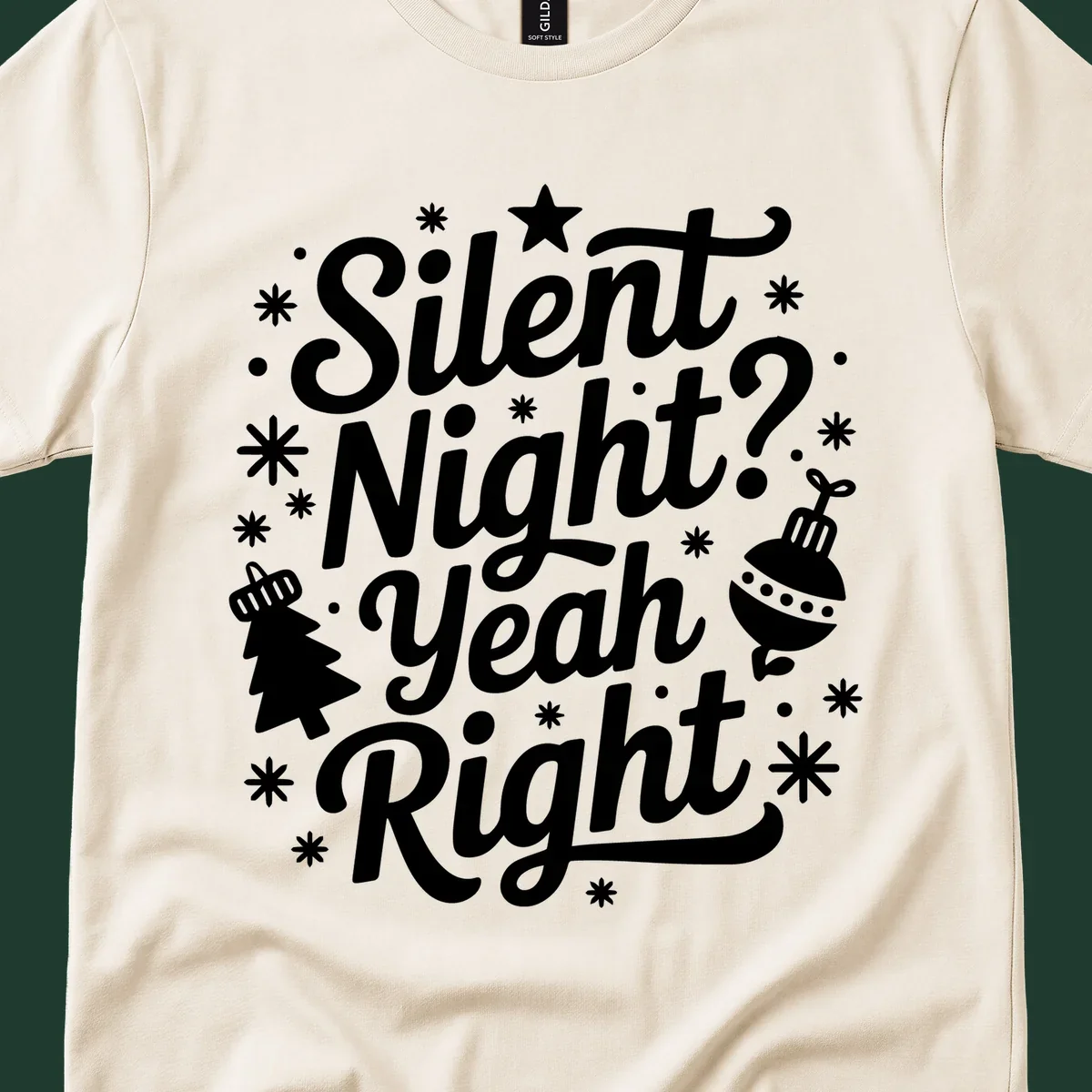 Silent Night Yeah Right typography design with snowflakes, star, and Christmas tree.