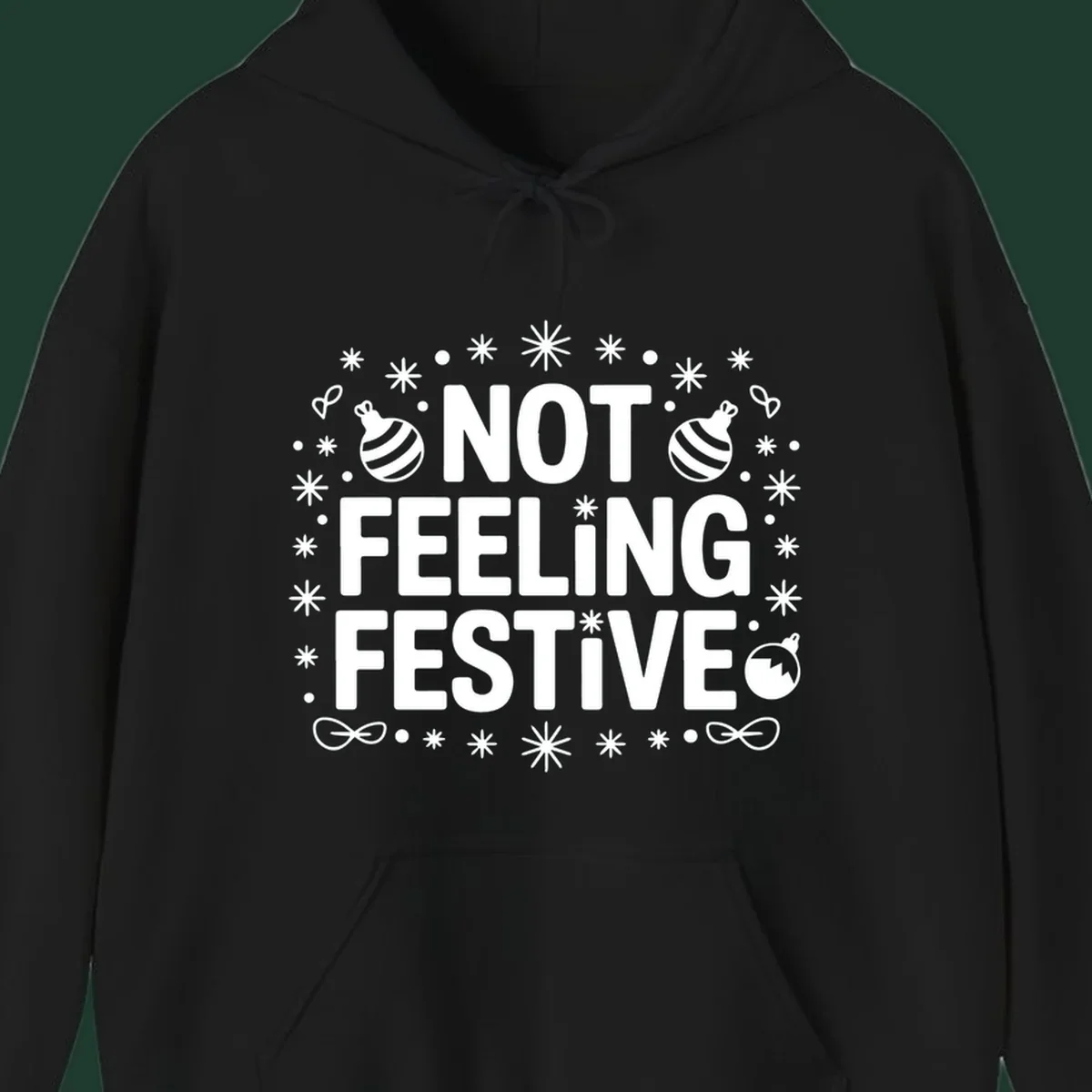 Not feeling festive graphic tee with text and winter elements.