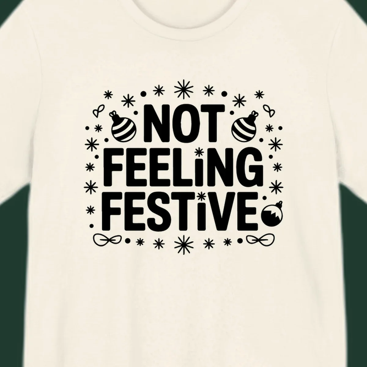 Not feeling festive graphic tee with text and winter elements.