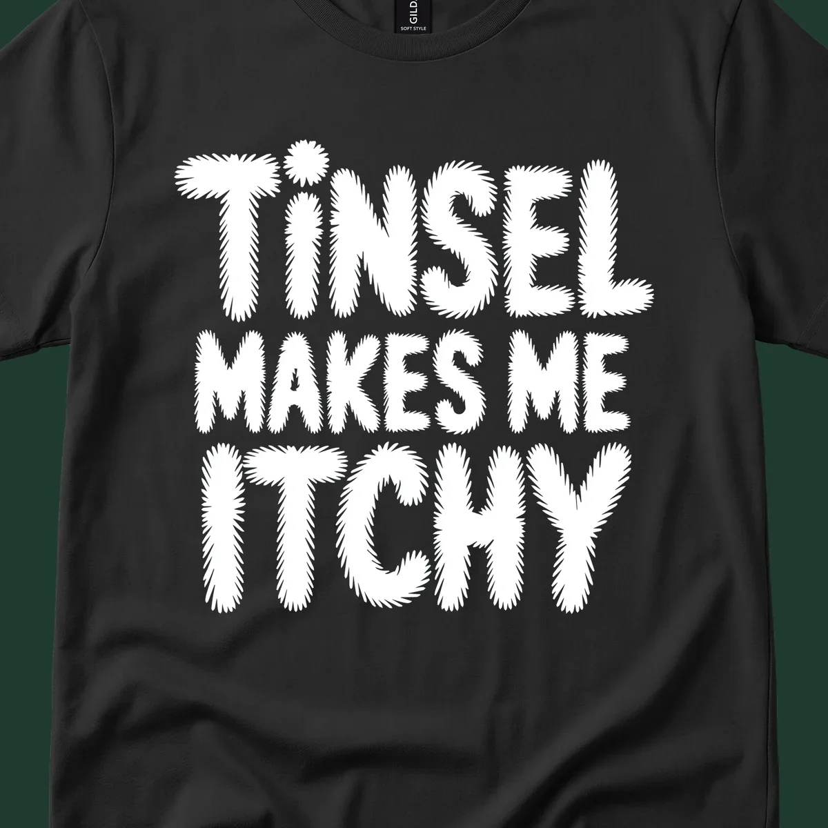 Tinsel Makes Me Itchy typography design in white on black, and black on white.
