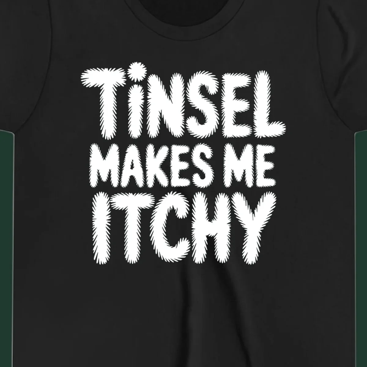 Tinsel Makes Me Itchy typography design in white on black, and black on white.