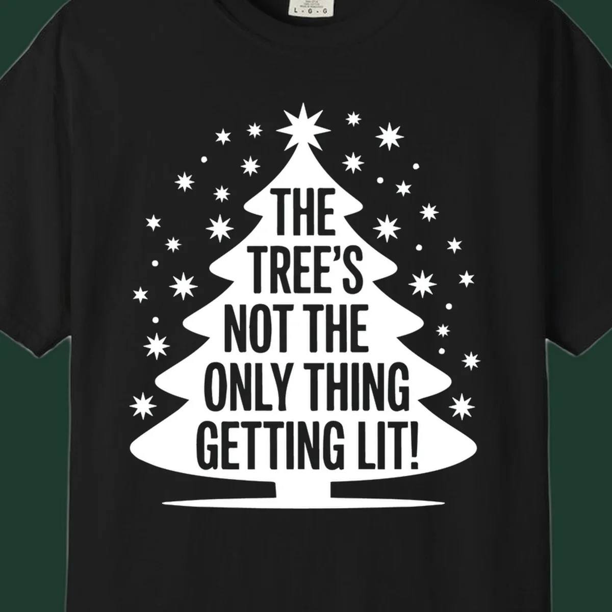 Christmas tree silhouette with text "THE TREE'S NOT THE ONLY THING GETTING LIT!" and surrounding stars.