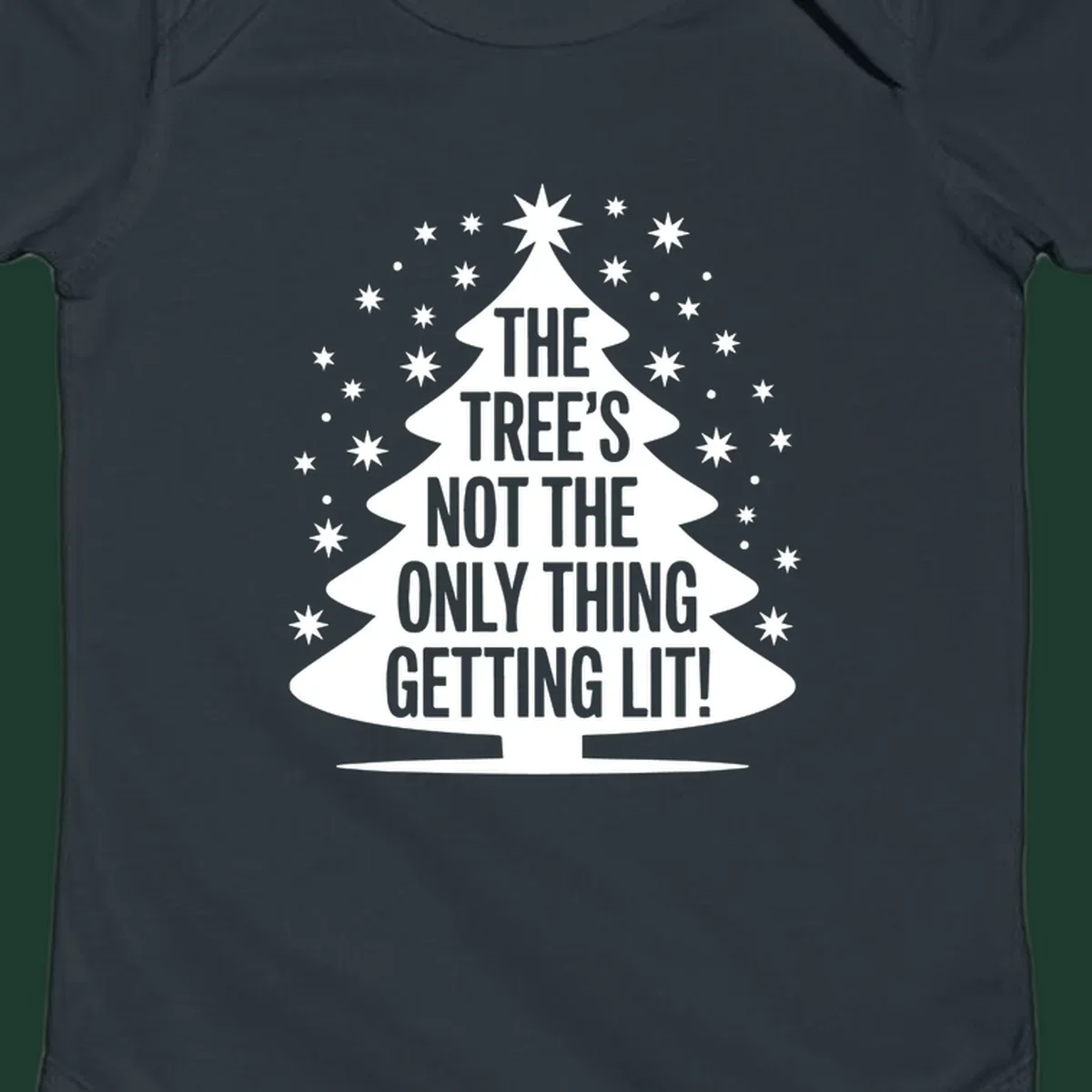 Christmas tree silhouette with text "THE TREE'S NOT THE ONLY THING GETTING LIT!" and surrounding stars.