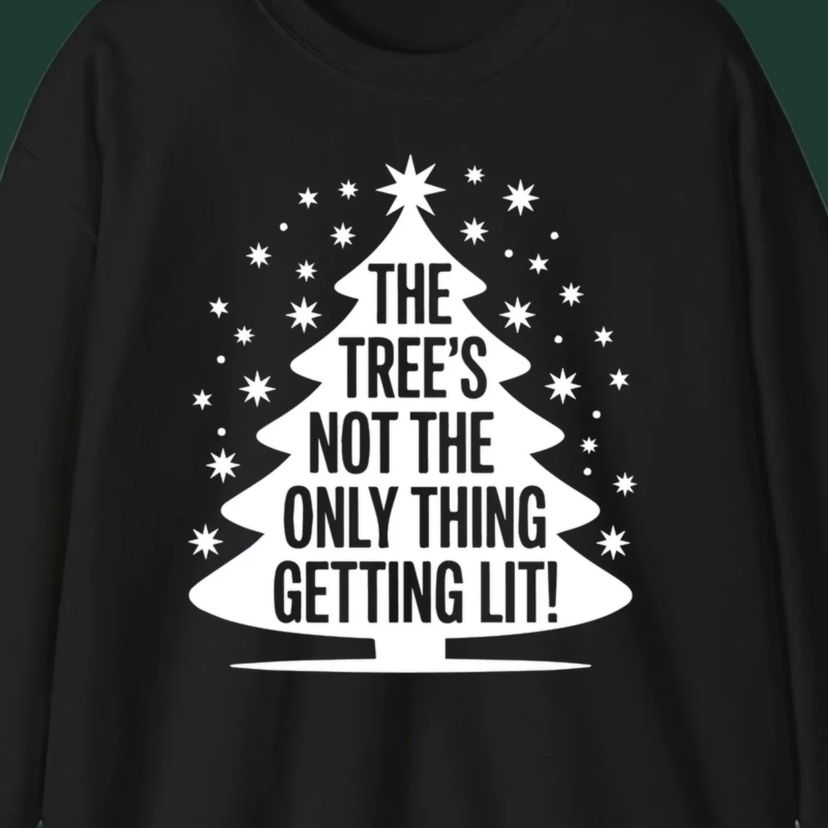 Christmas tree silhouette with text "THE TREE'S NOT THE ONLY THING GETTING LIT!" and surrounding stars.