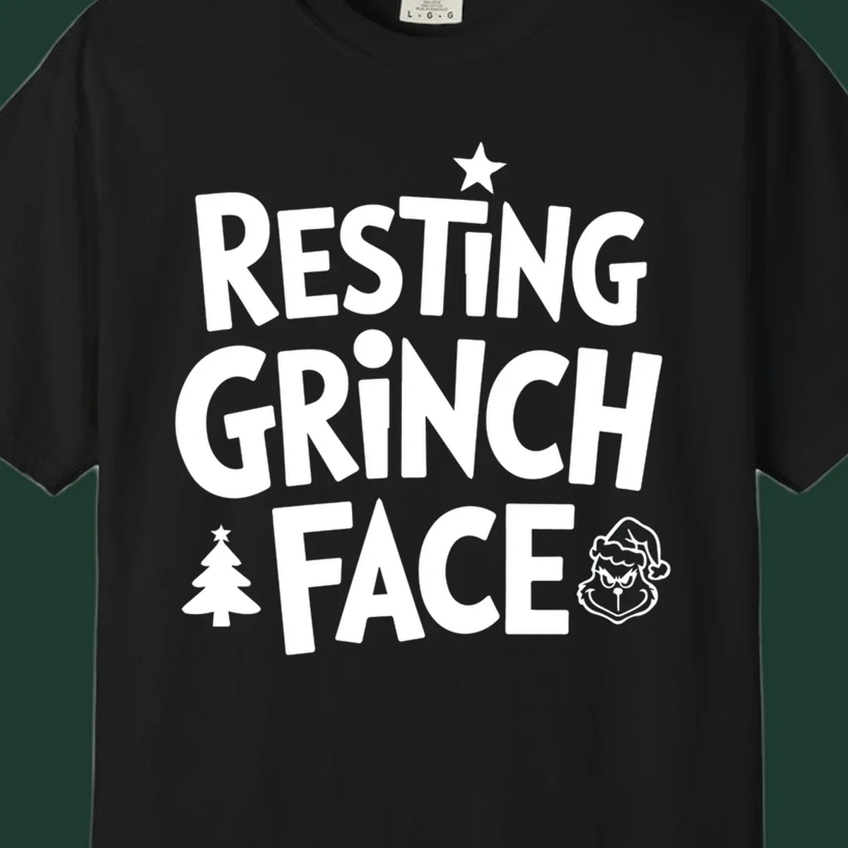 Resting Grinch Face graphic design with typography and character elements.