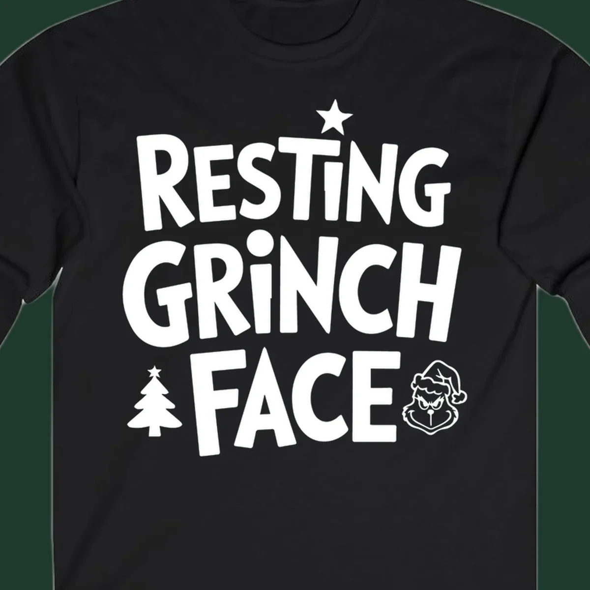 Resting Grinch Face graphic design with typography and character elements.
