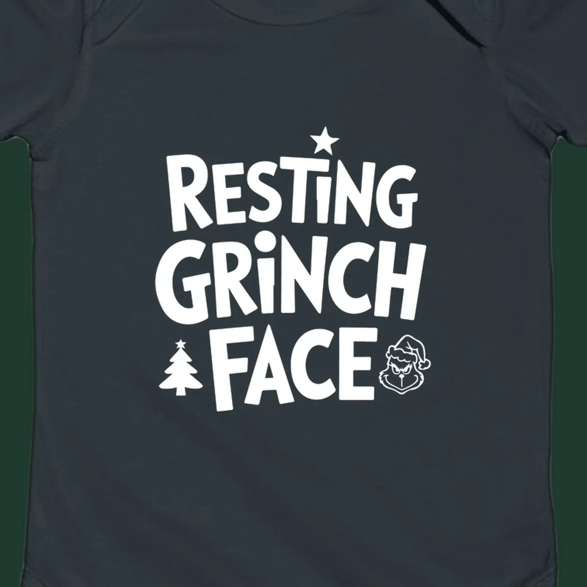 Resting Grinch Face graphic design with typography and character elements.