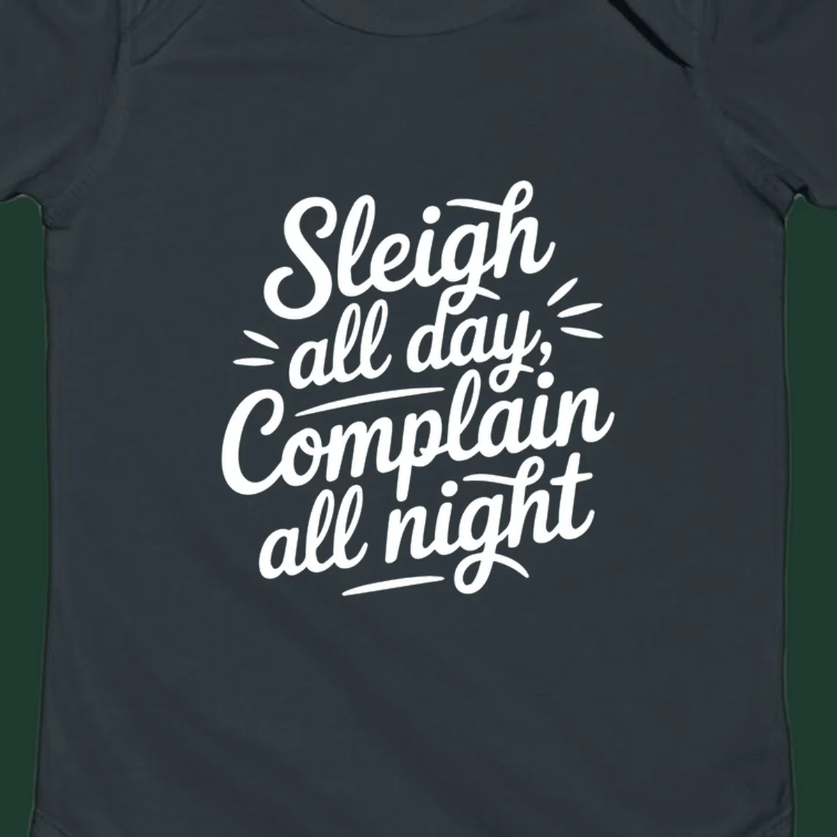 Sleigh all day complain all night typography design in white script font.