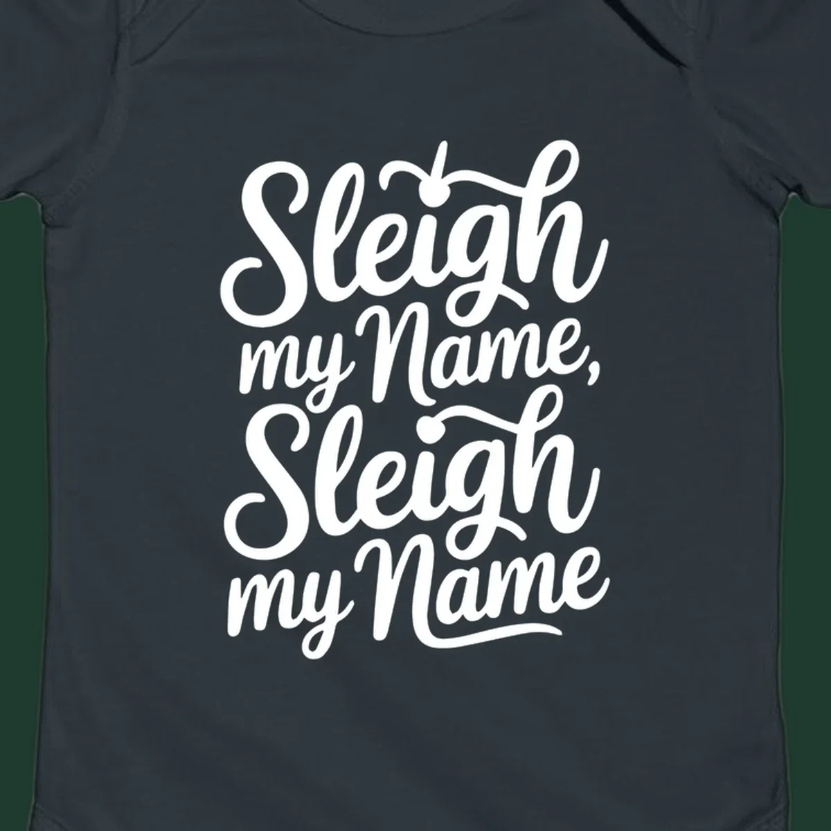 Sleigh my name pun text design in white script font on black.