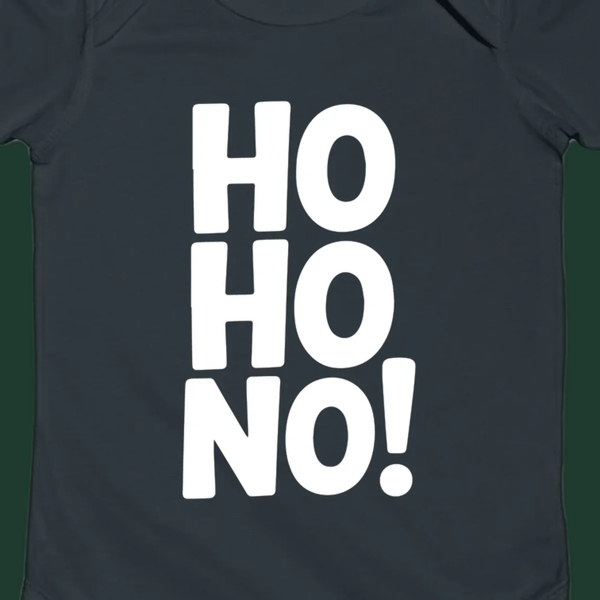 Bold white typography spelling HO HO NO, a modern ironic Christmas phrase.