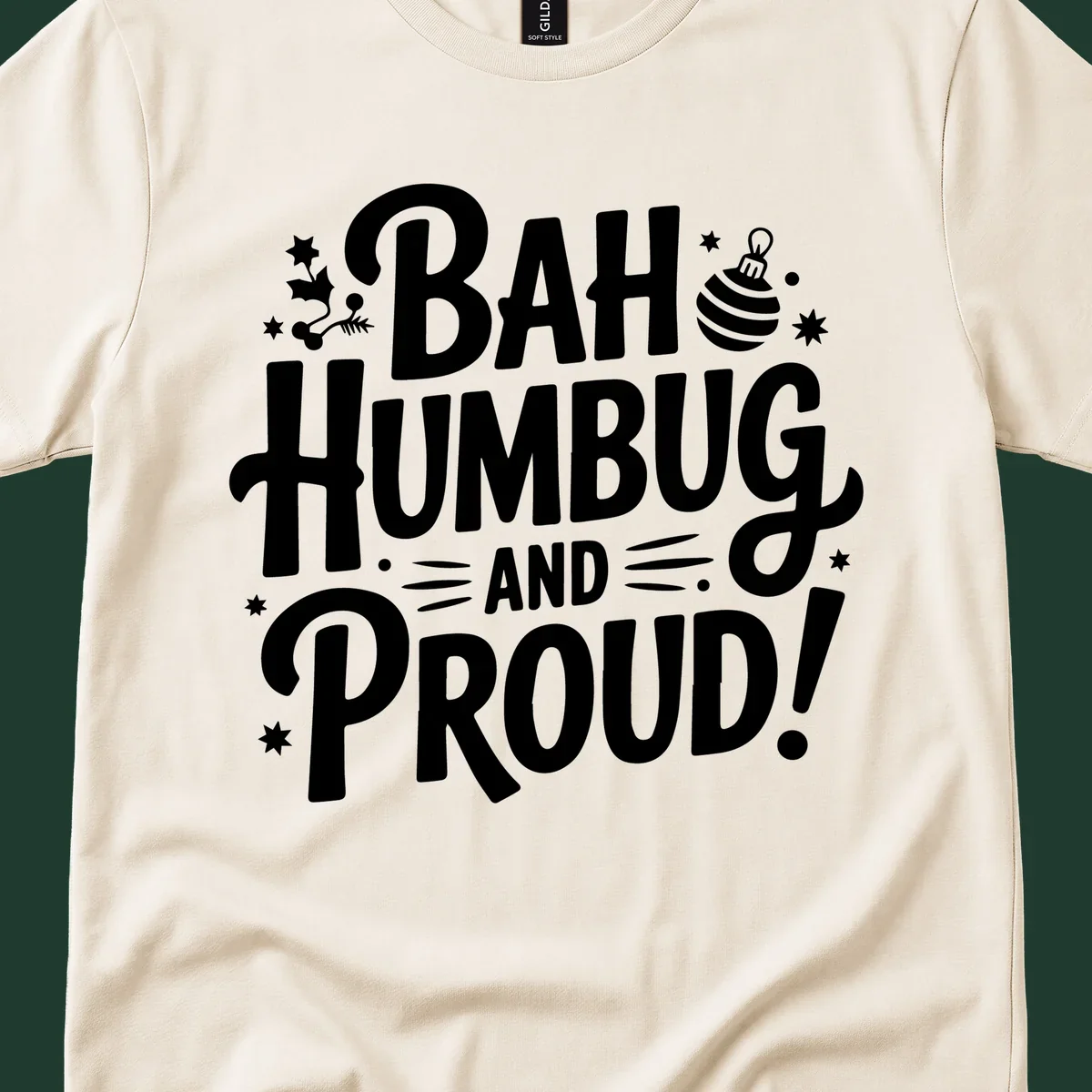 Bah Humbug And Proud typography design with holly and stars.