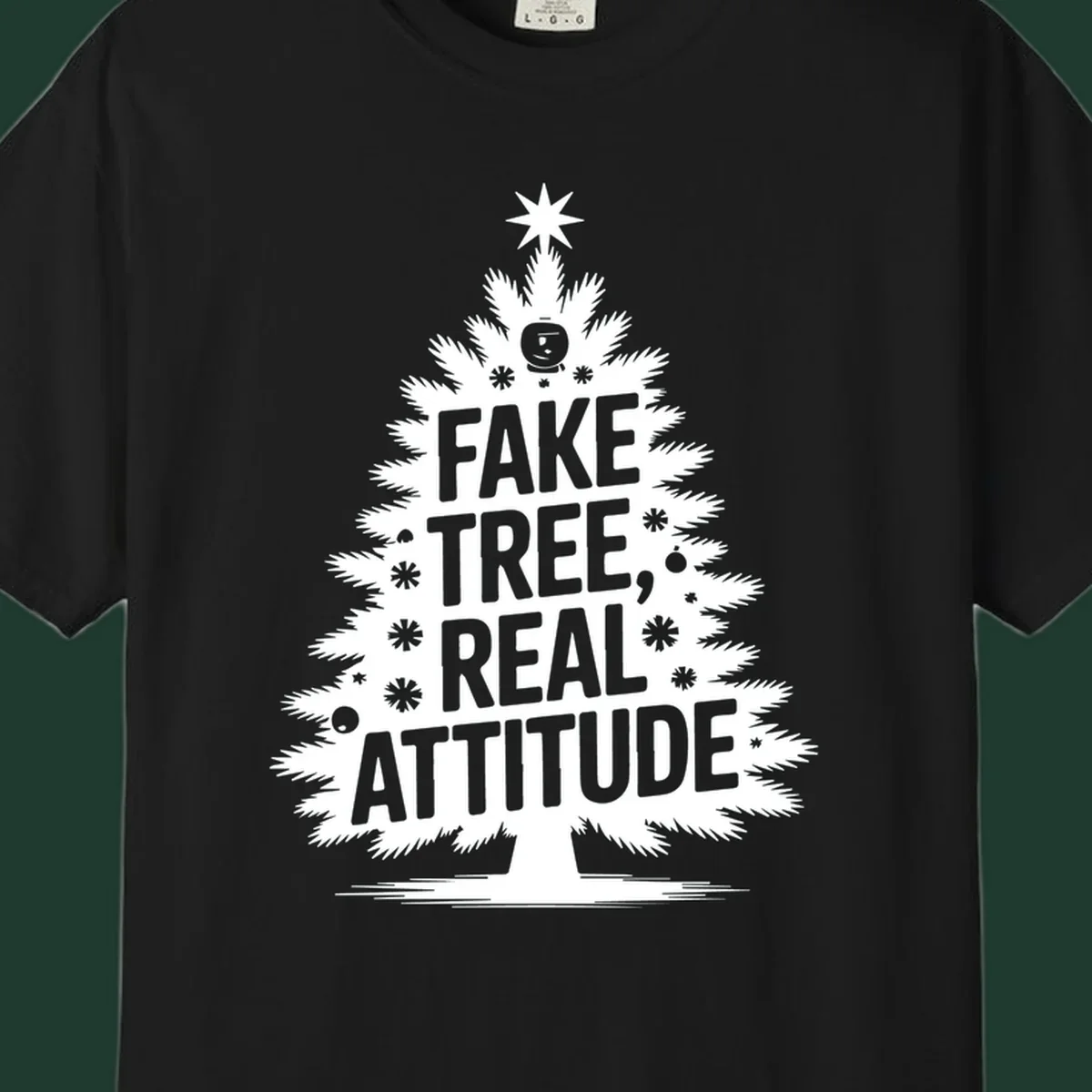 Fake tree, real attitude Christmas graphic with a stylized tree and bold text.