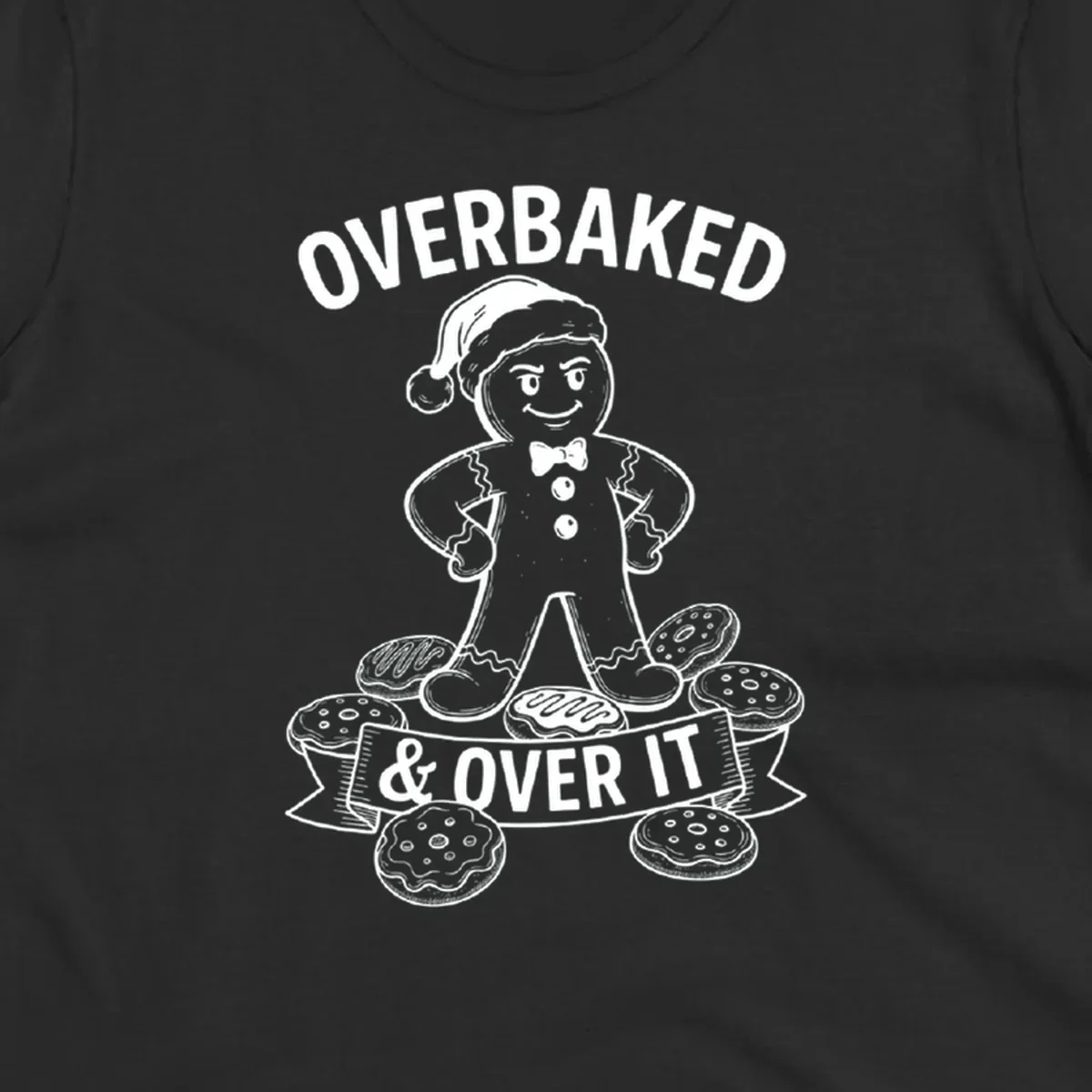 Overbaked gingerbread man with Santa hat and cookies, text says OVERBAKED & OVER IT.