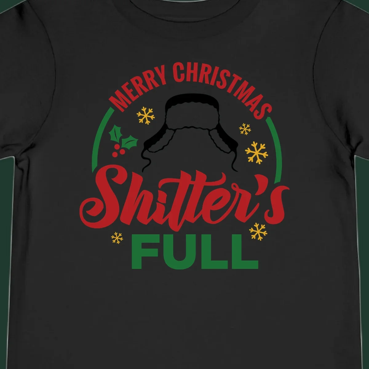 Christmas Shitter's Full graphic with text, hat silhouette, holly, and snowflakes.