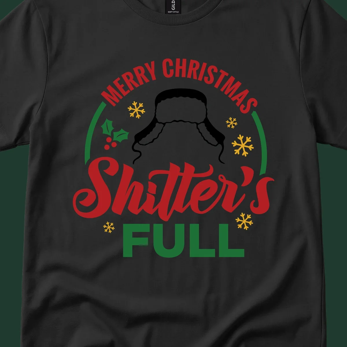 Christmas Shitter's Full graphic with text, hat silhouette, holly, and snowflakes.