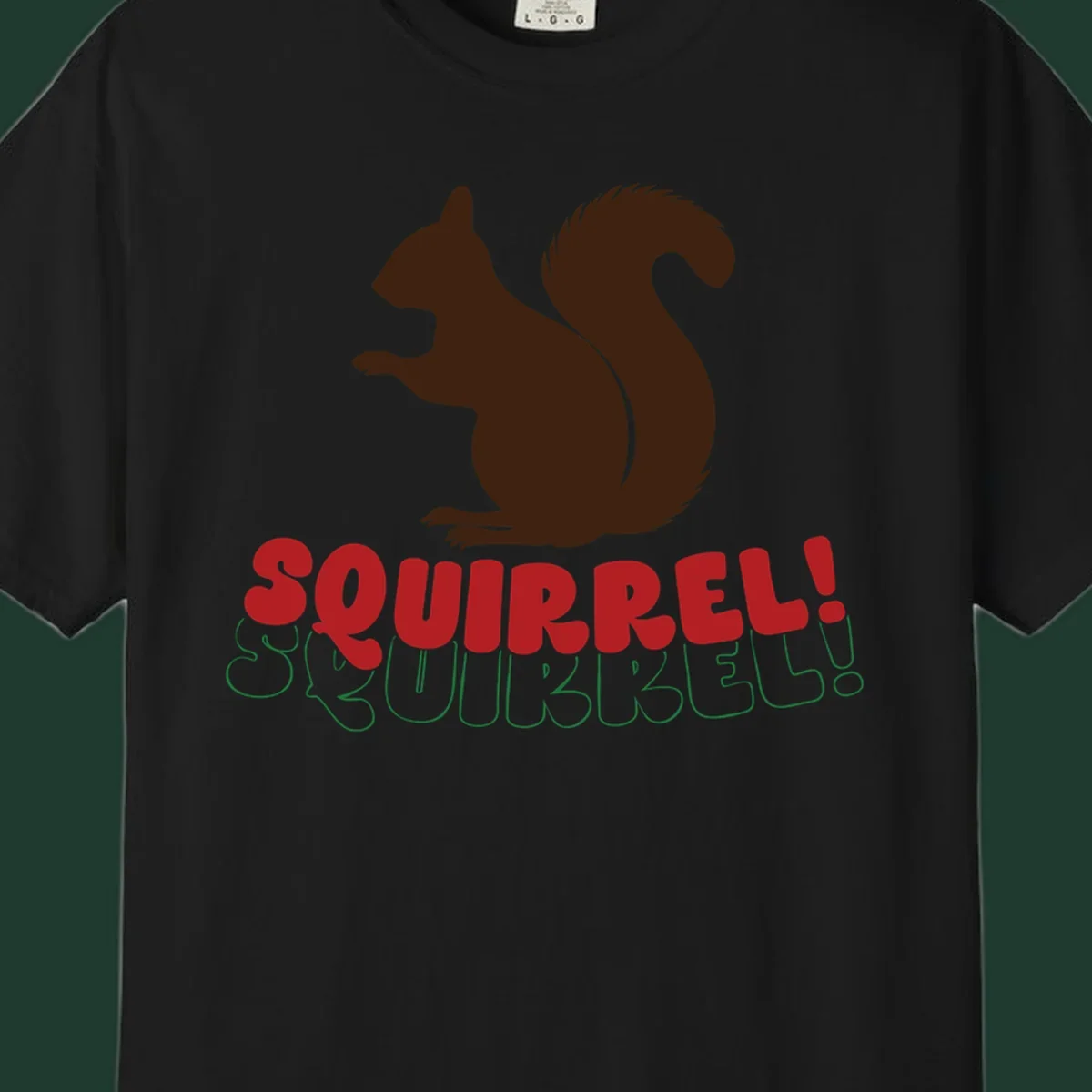 Squirrel! Christmas Typography design with a brown squirrel silhouette and bold red and green text.