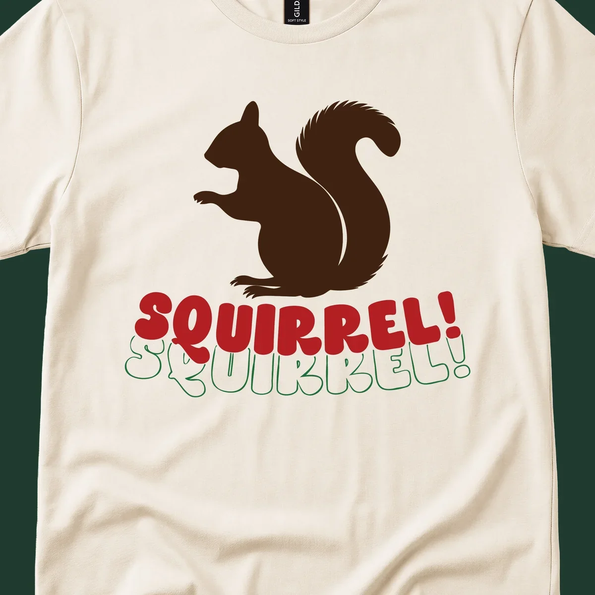 Squirrel! Christmas Typography design with a brown squirrel silhouette and bold red and green text.