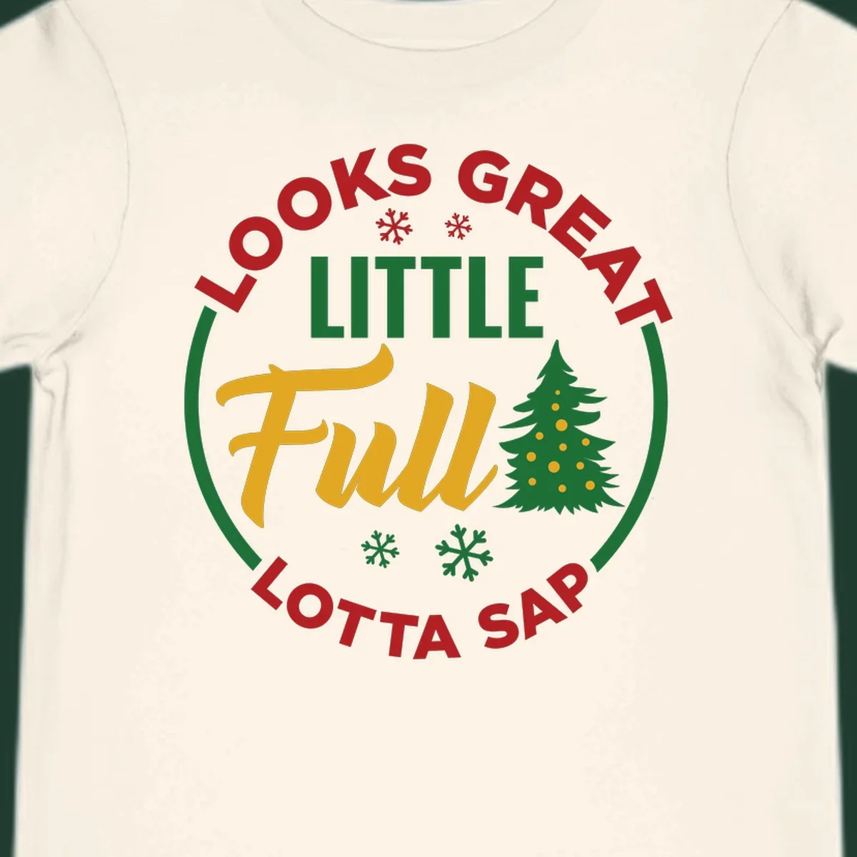 Circular text reads "Looks Great Little Full Lotta Sap" with a Christmas tree and snowflakes.