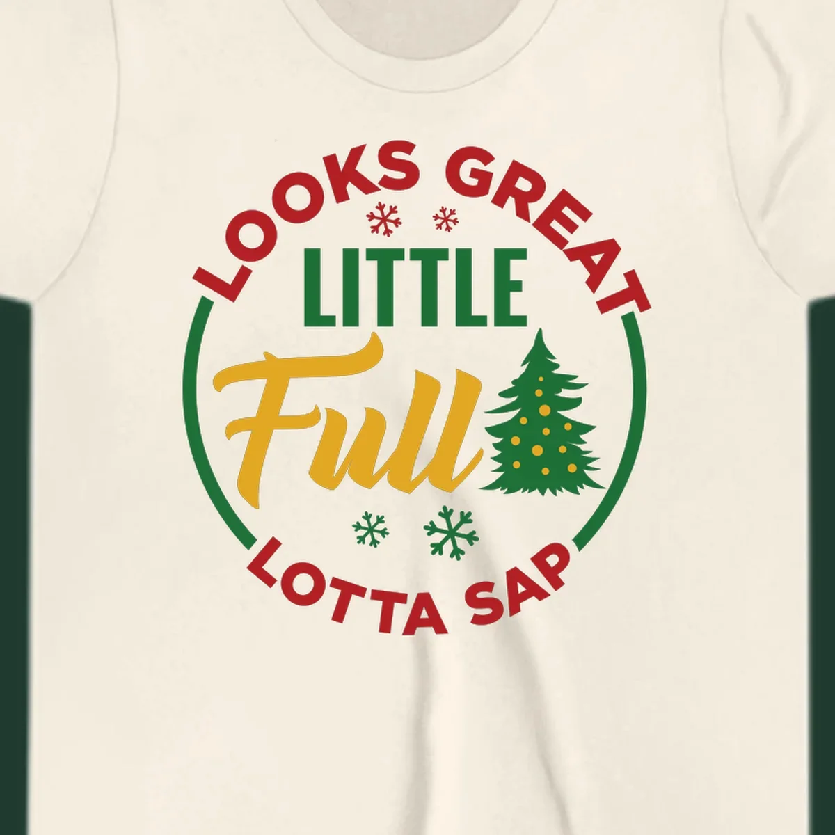 Circular text reads "Looks Great Little Full Lotta Sap" with a Christmas tree and snowflakes.
