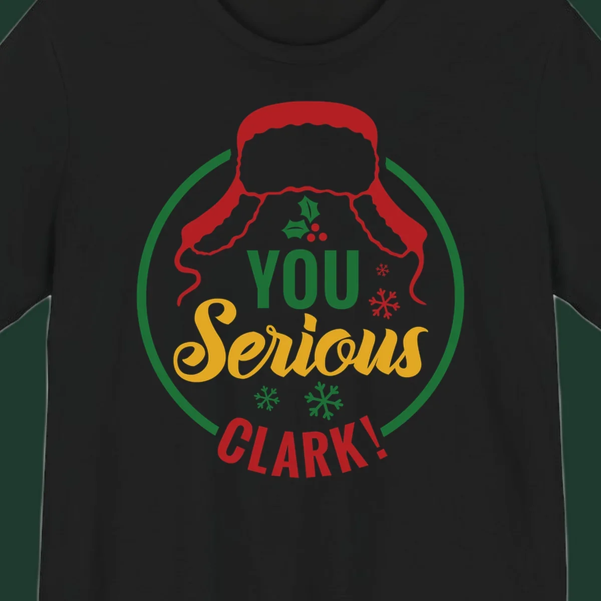Christmas Clark quote graphic with a hat, holly, and snowflakes.