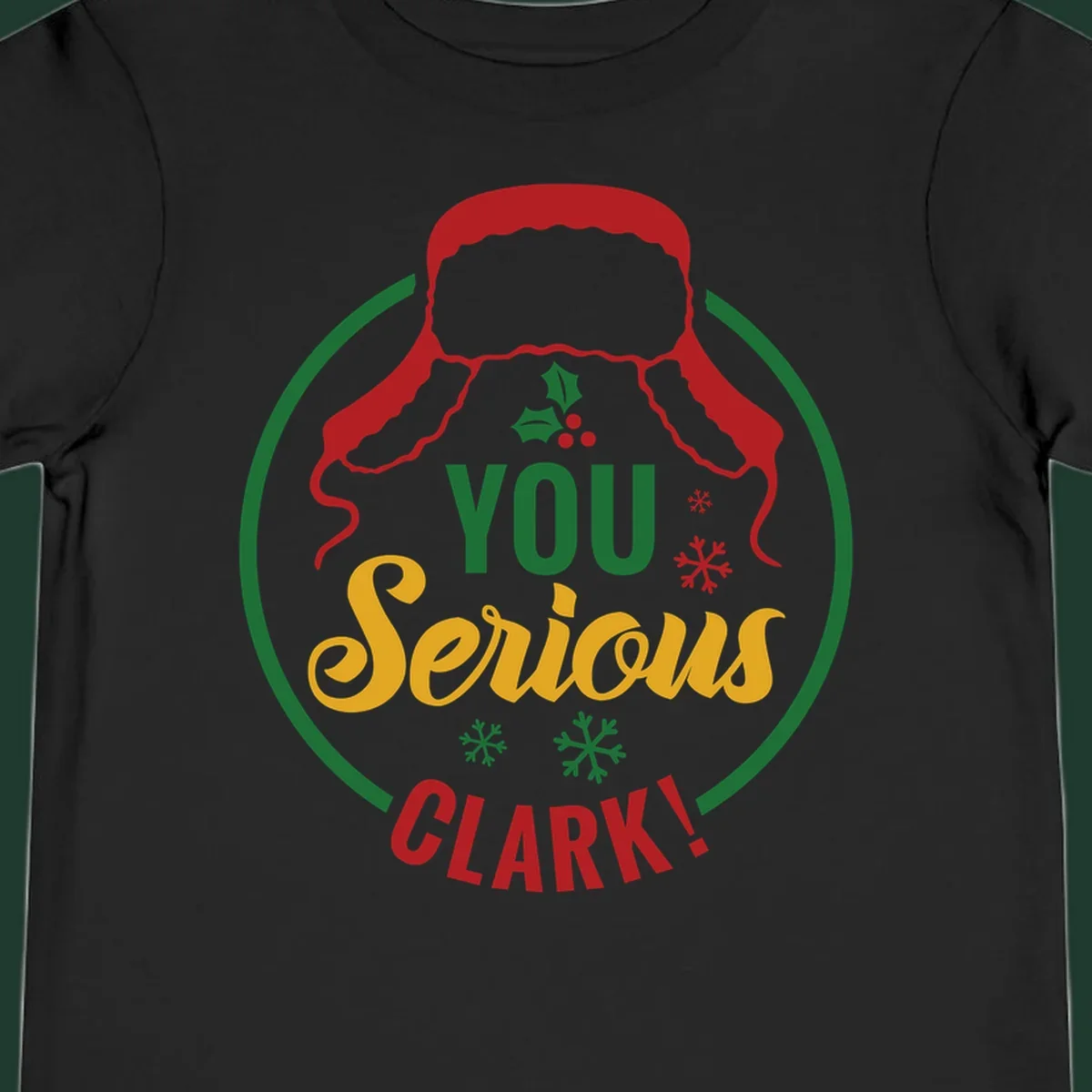 Christmas Clark quote graphic with a hat, holly, and snowflakes.