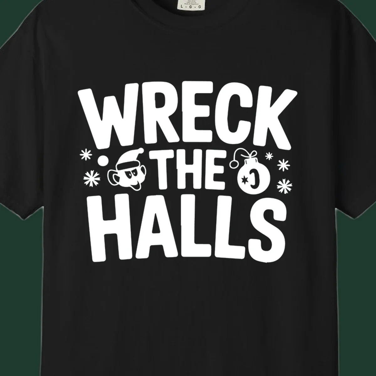 Wreck the Halls Christmas phrase with cartoon Santa hat face and ornament graphic.