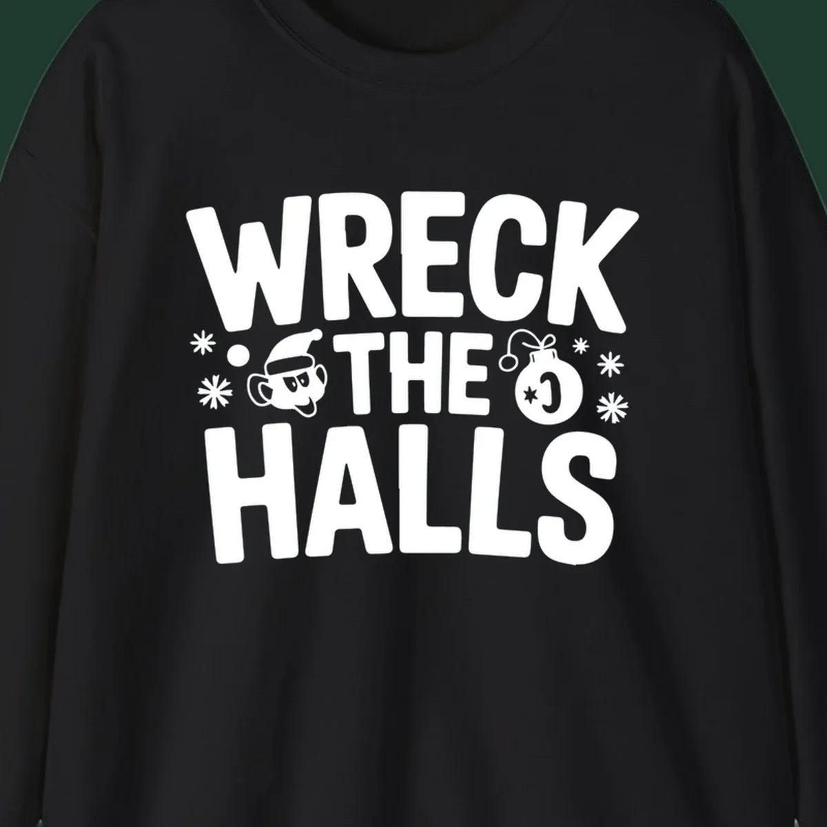 Wreck the Halls Christmas phrase with cartoon Santa hat face and ornament graphic.