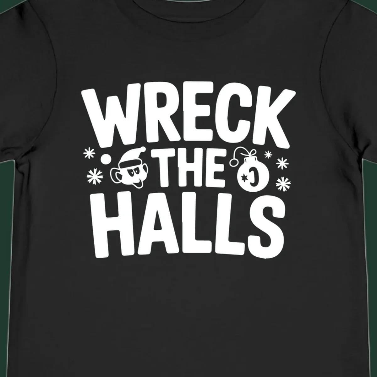 Wreck the Halls Christmas phrase with cartoon Santa hat face and ornament graphic.