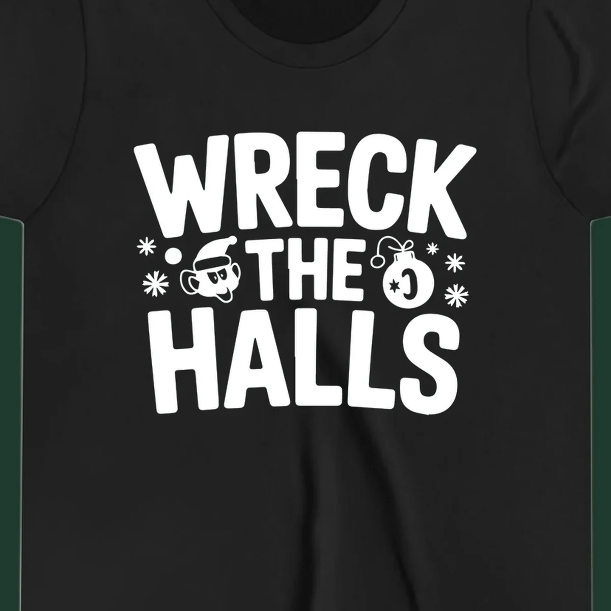 Wreck the Halls Christmas phrase with cartoon Santa hat face and ornament graphic.