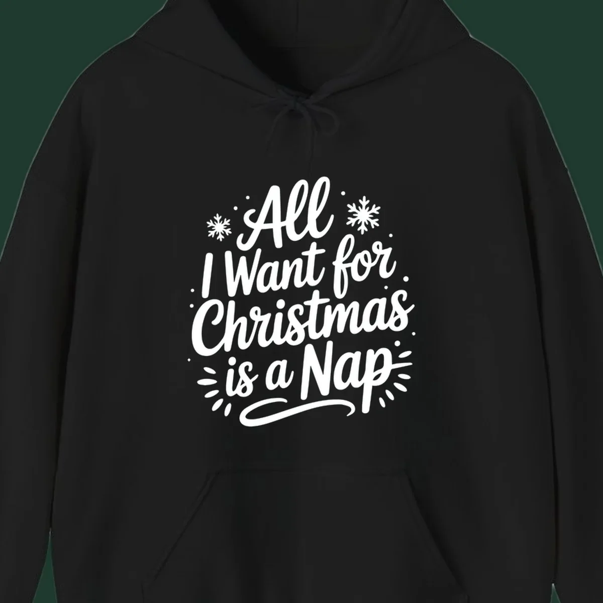 All I Want for Christmas Is A Nap typography design with snowflakes.
